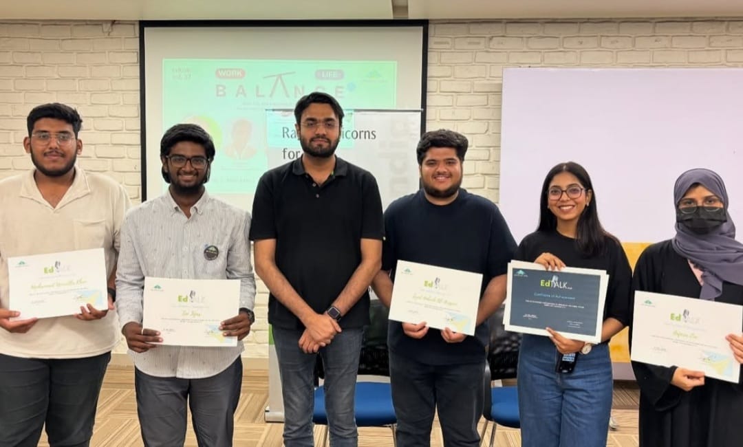 Group of founders cutting ribbon